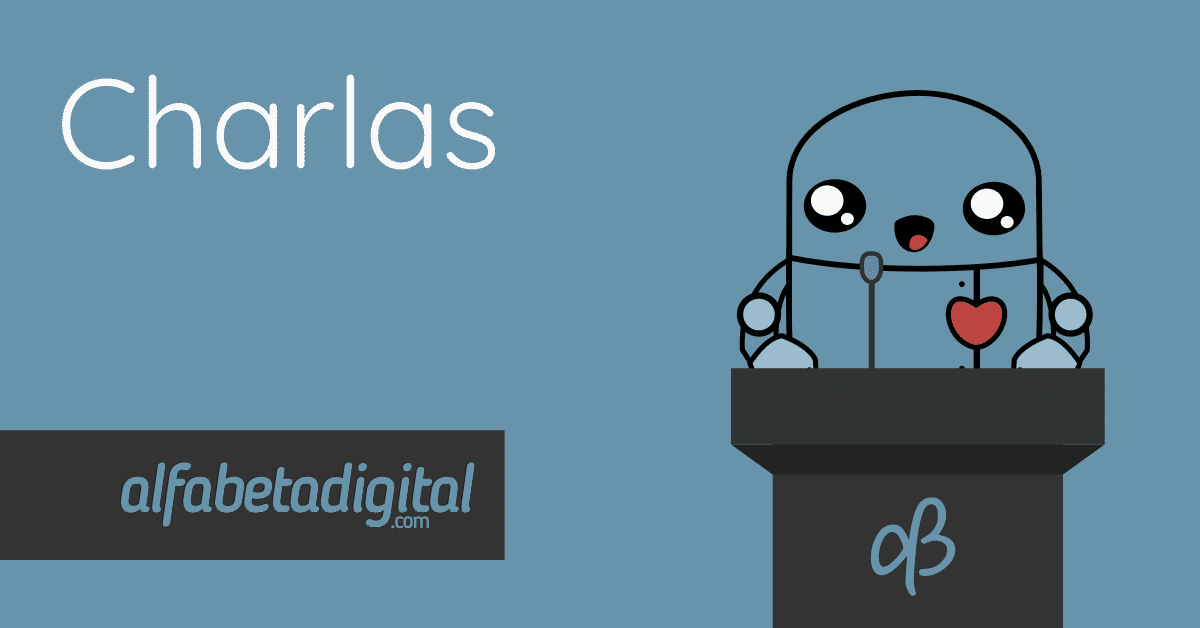 Beta, de alfabetadigital está en un podio brindando una charla